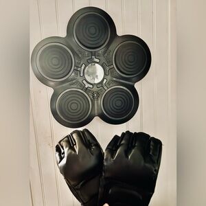 New in box, Boxing machine with music  connects to Bluetooth, Comes with gloves